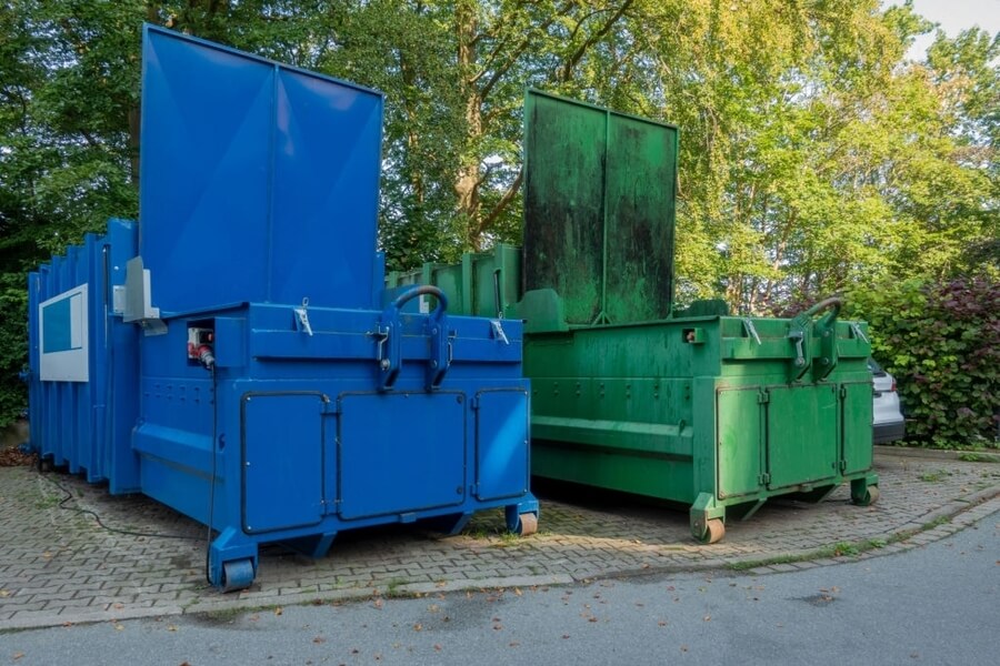 a picture of two big dumpster