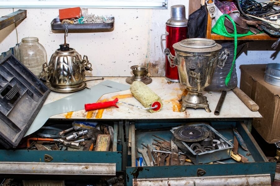 a picture of a piled high inside a house that will be sold soon at an estate sale