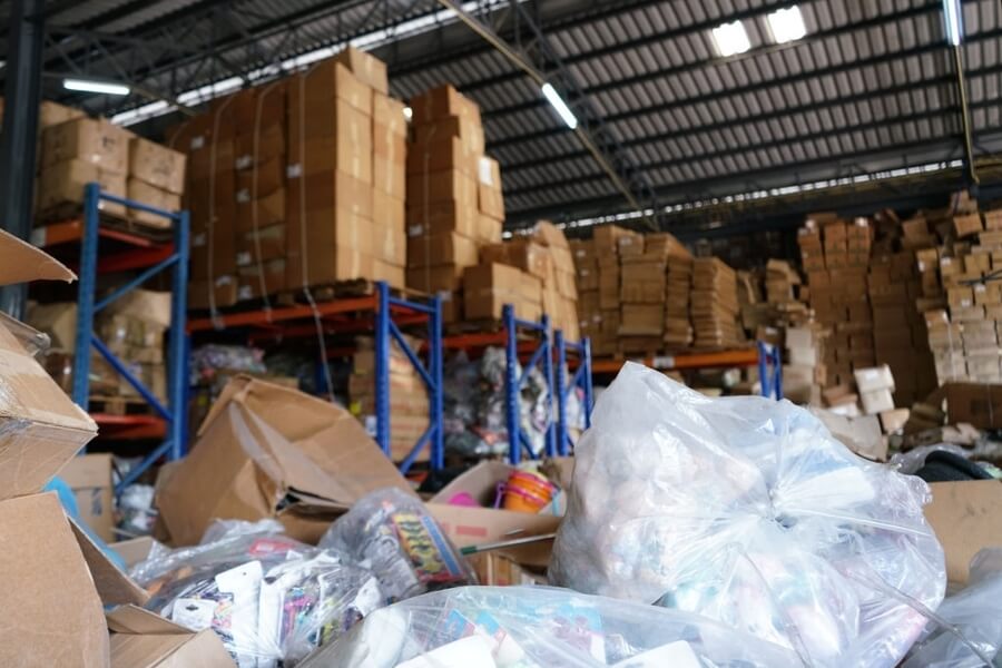 a photo of a warehouse with a lot of junks that needs to be cleaned